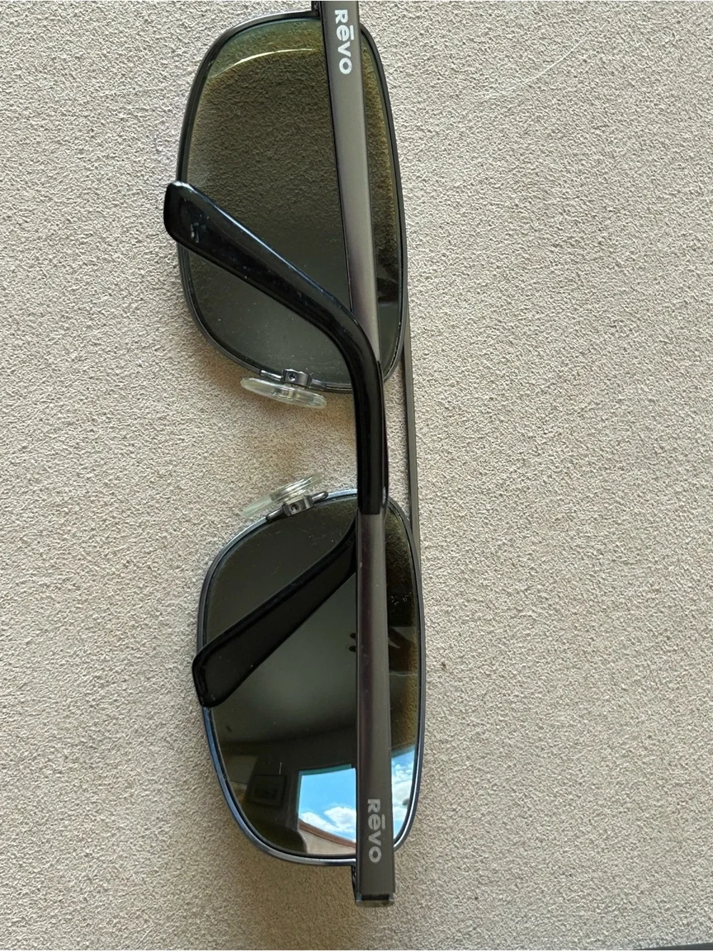 Revo Polarized Sunglasses — Black Frame with Blue Logo
